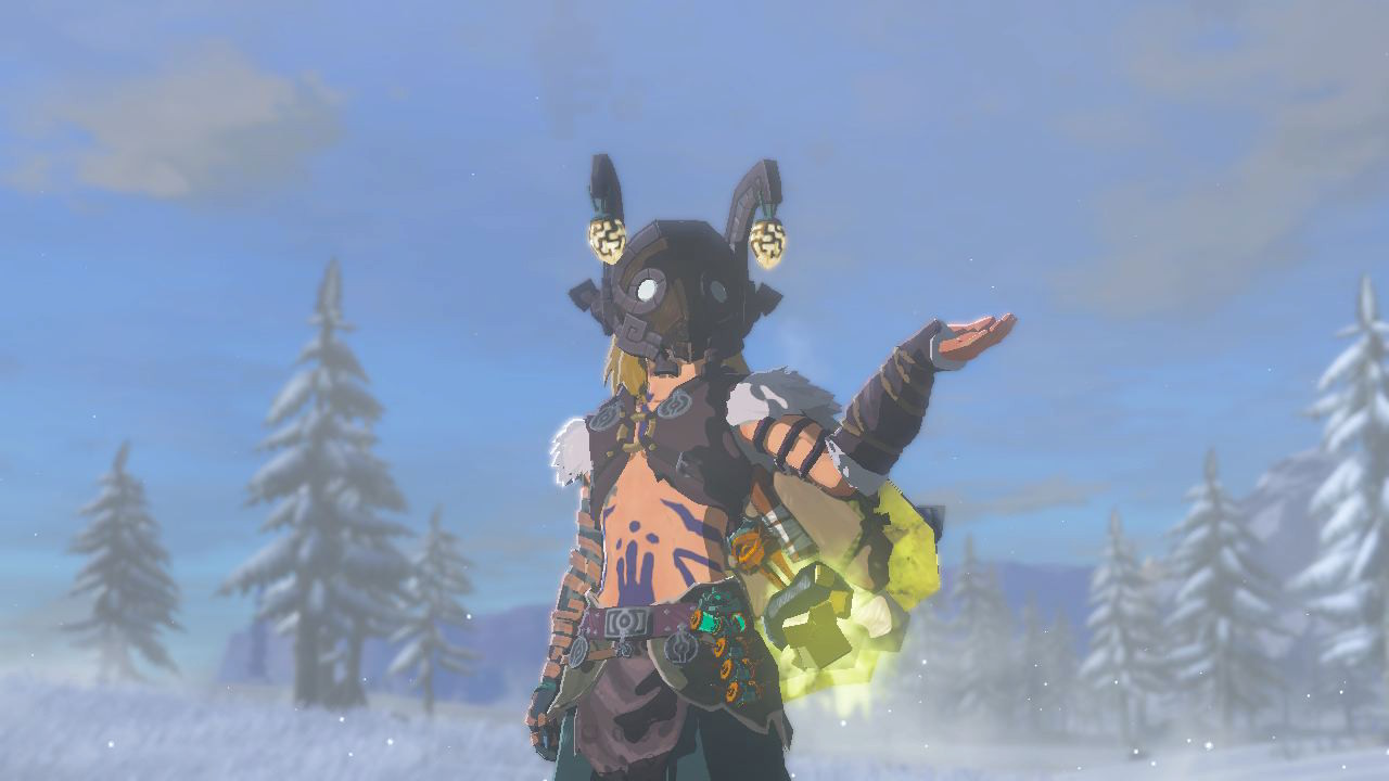 Link lifts up one hand while posing with the Miner’s Helm in Zelda: Tears of the Kingdom