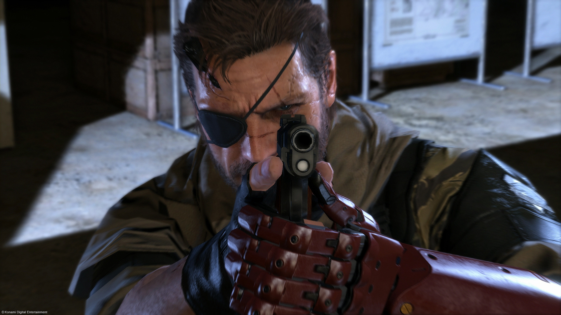 Snake takes aim with a handgun in Metal Gear Solid 5: The Phantom Pain